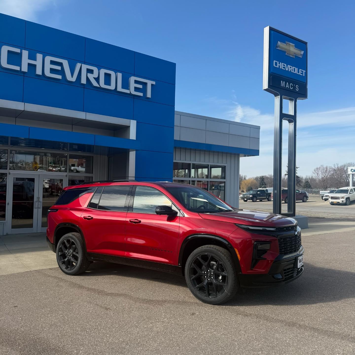 2026 Chevrolet Traverse RS in Radiant Red Tintcoat — front three-quarter view