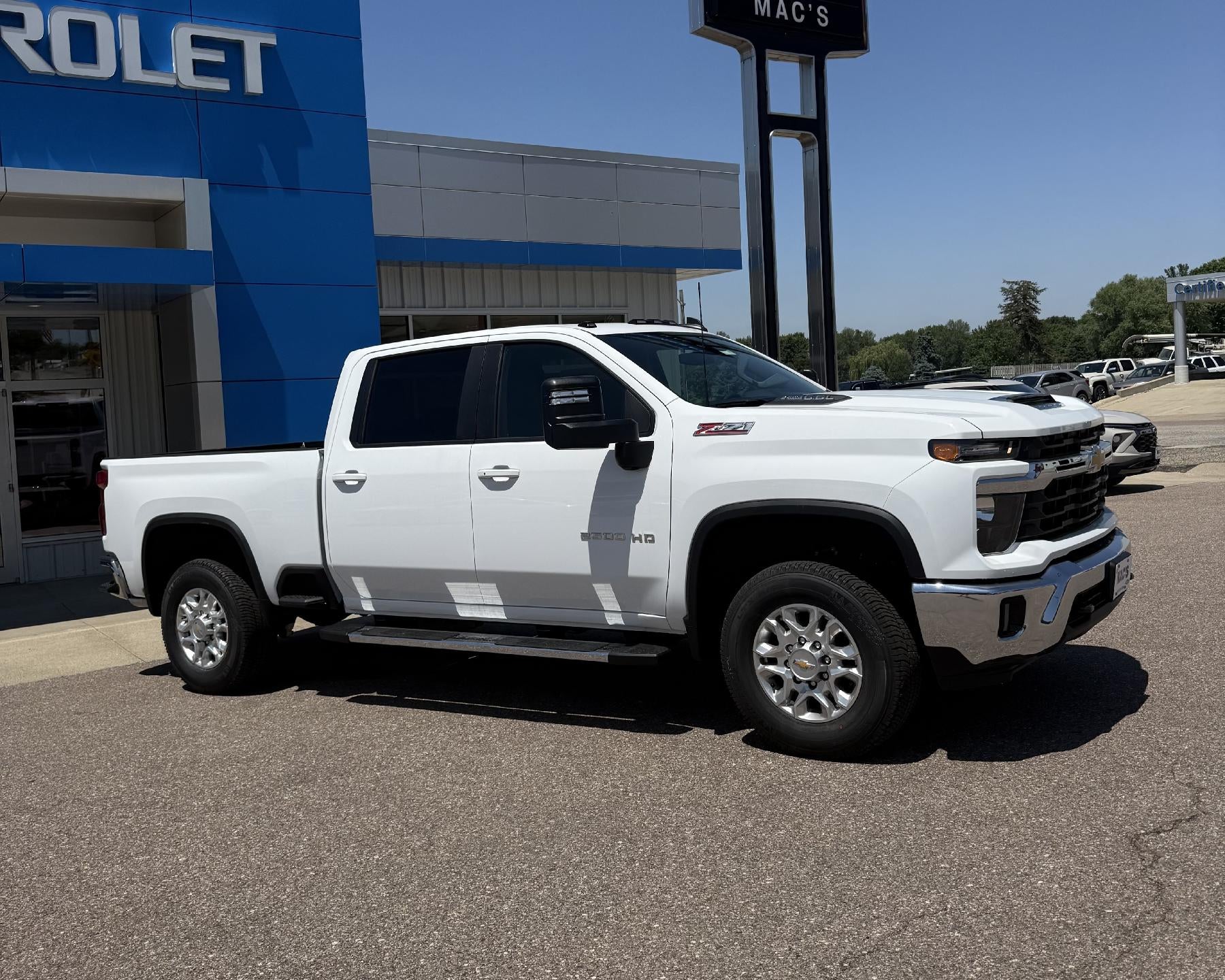 2026 Chevrolet Silverado 2500 HD LT in Summit White — front three-quarter view