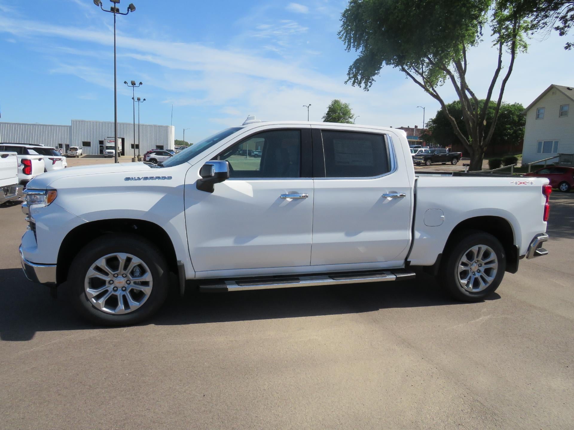 2026 Chevrolet Silverado 1500 LTZ in Summit White — front three-quarter view