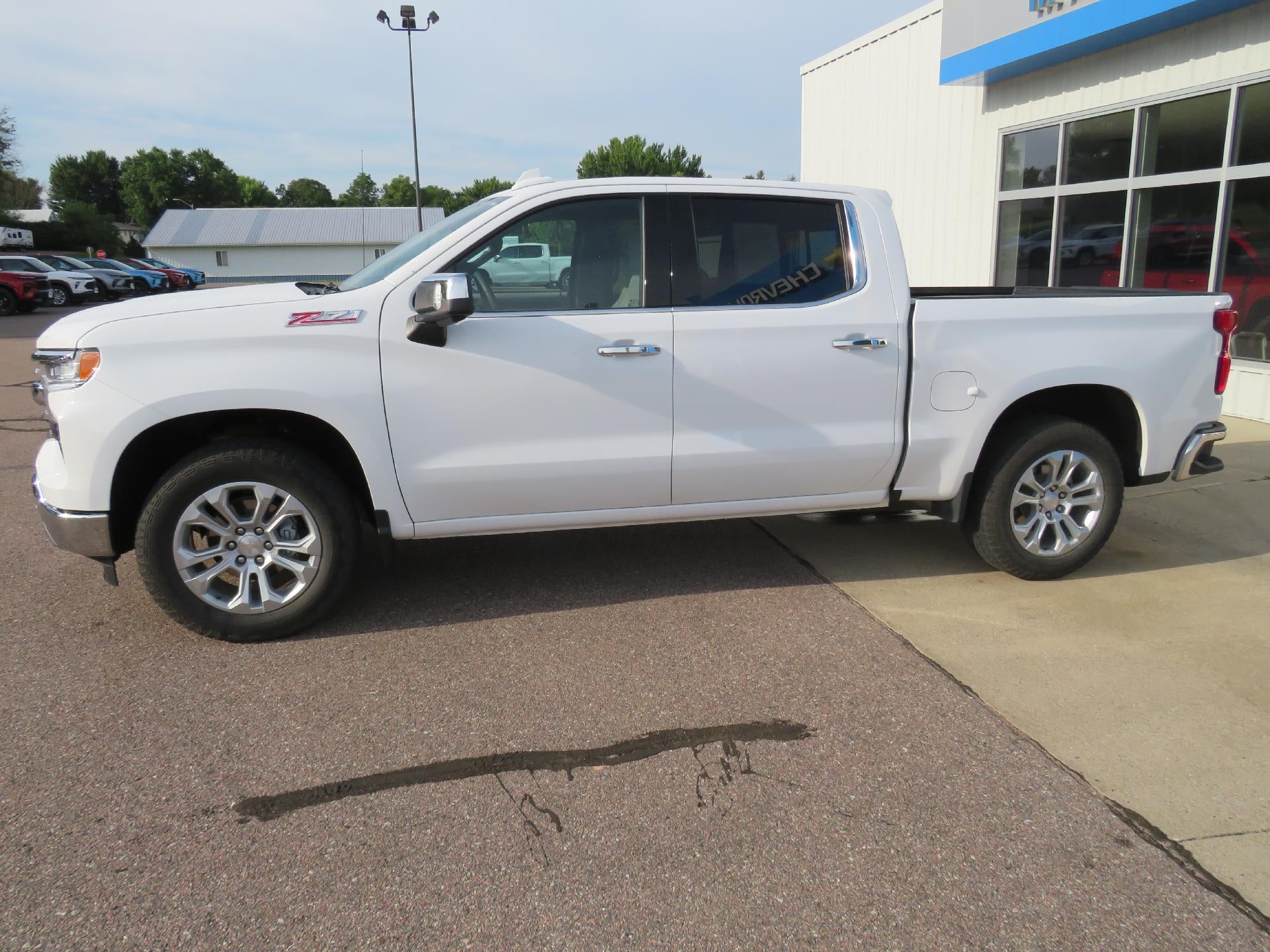 2025 Chevrolet Silverado 1500 LTZ in Summit White — front three-quarter view