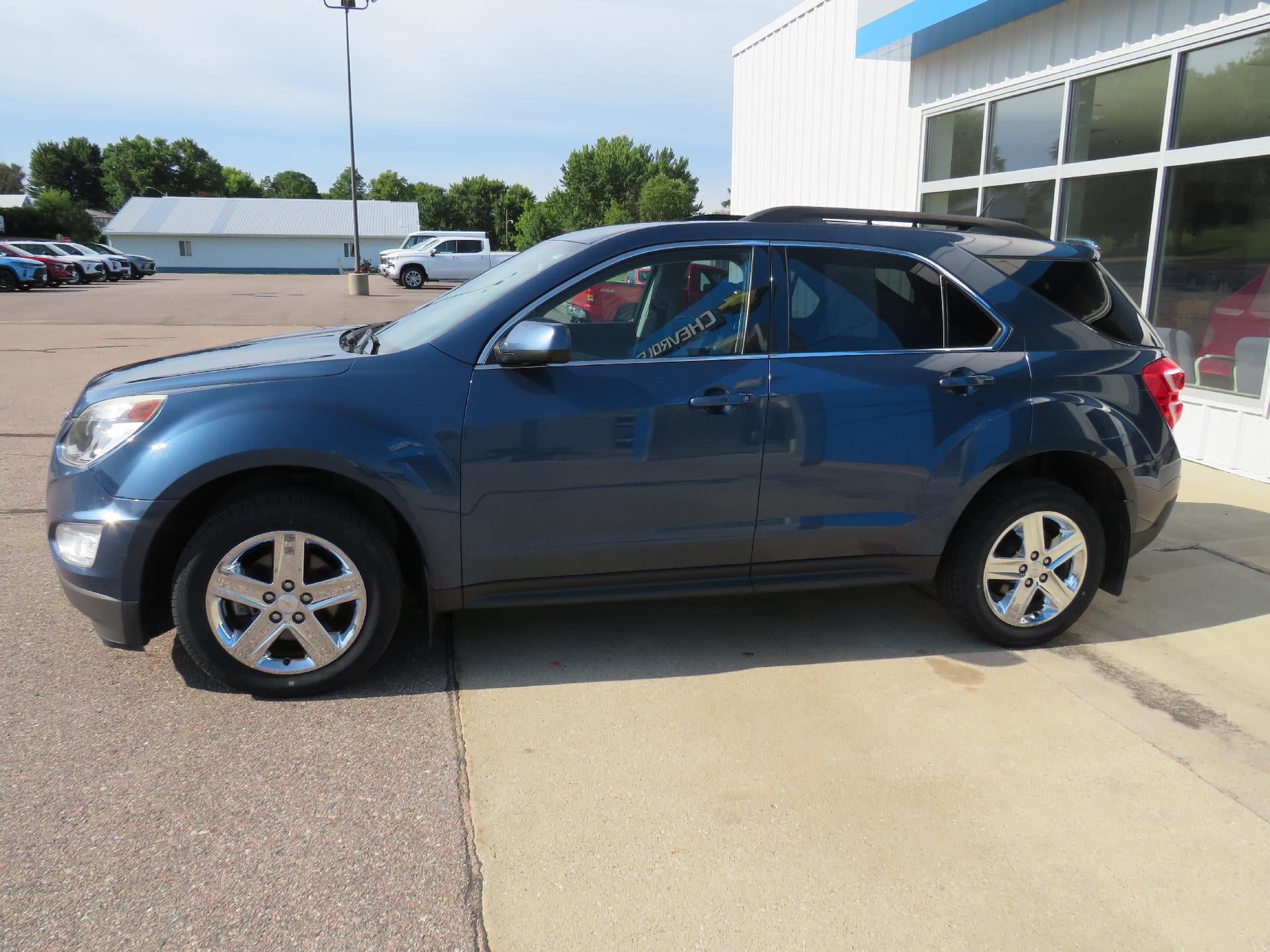 2016 Chevrolet Equinox LT in Patriot Blue Metallic — front three-quarter view