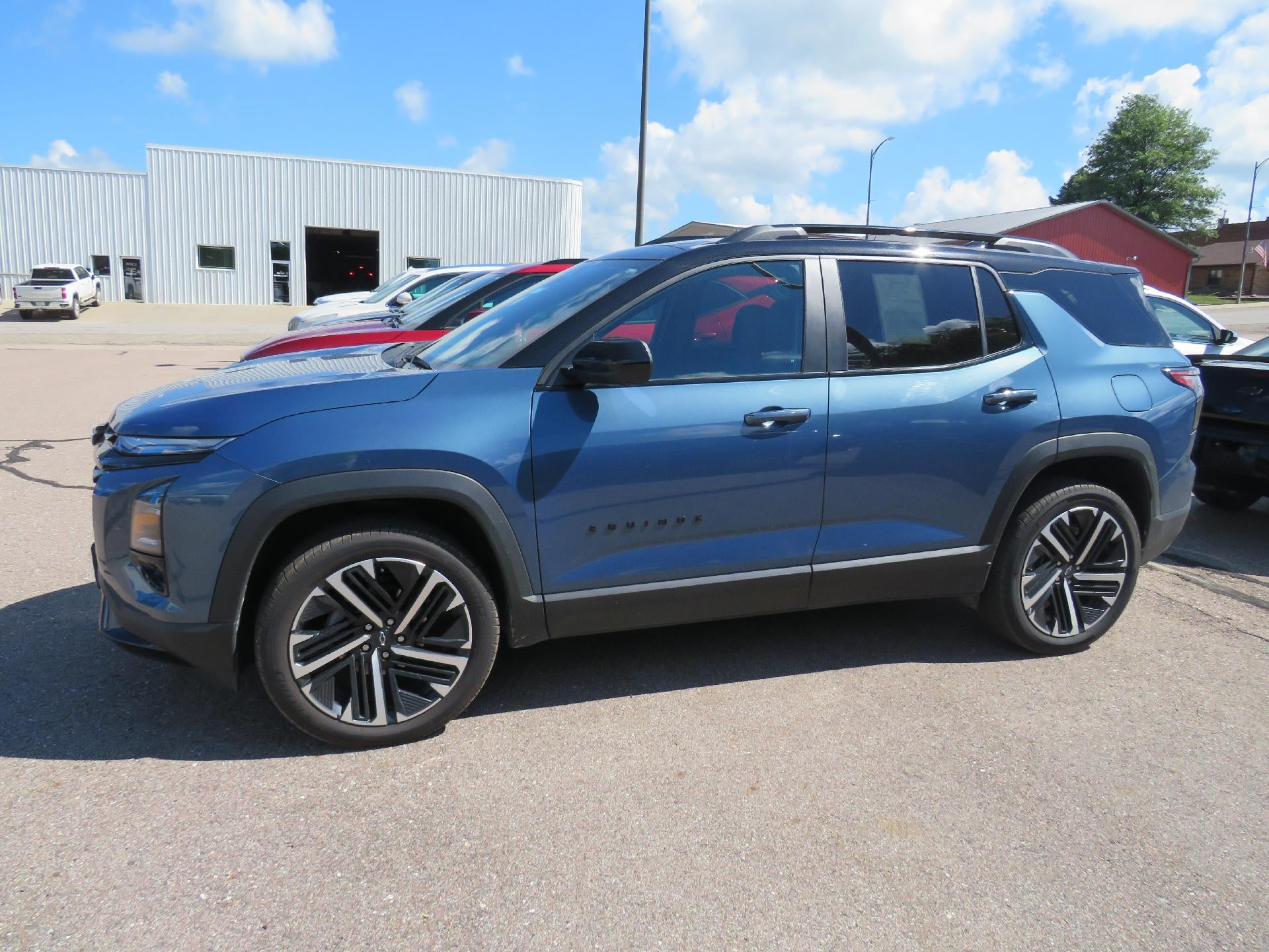 2026 Chevrolet Equinox RS in Lakeshore Blue Metallic — front three-quarter view